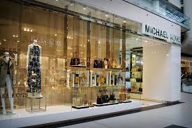 jimmy choo acquired by michael kors